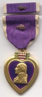 Source: http://www.45thdivision.org/Pictures/General_Knowlege/RankMedalsPatches/Medals/PurpleW1Oak.jpg